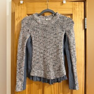 Moth brand from Anthropologie. Small sweater. 

(Too small for me.)